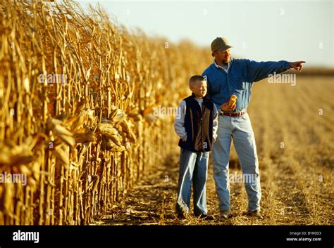 Farmer and son - 6. “Farming is a profession of hope.”. - Brian Brett. 7. “A reasonable agriculture would do its best to emulate nature. Rather than change the earth to suit a crop it would diversify its crops to suit the earth.”. - Verlyn Klinkenborg. 8. “If you tickle the earth with a hoe she laughs with a harvest.”.